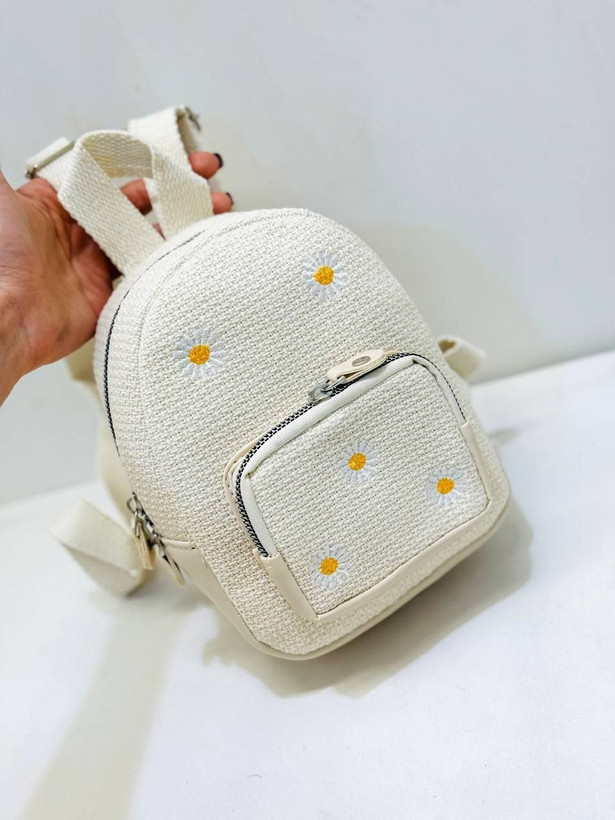 مینی کوله کنفی در دو طرح بابونه و ساده به صورت تک و عمده گوشی داخلش جا میشه قیمت منصفانه خرید از تولیدی